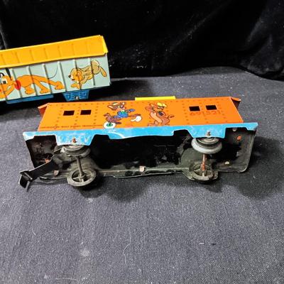 WALT DISNEY PRODUCTIONS TIN LITHO WIND UP TRAIN BY MARX (IN NEED OF REPAIR)