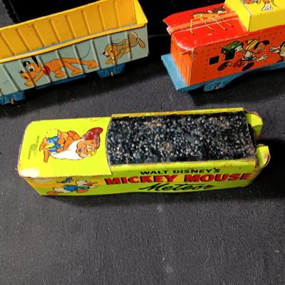 WALT DISNEY PRODUCTIONS TIN LITHO WIND UP TRAIN BY MARX (IN NEED OF REPAIR)