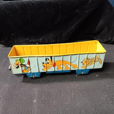 WALT DISNEY PRODUCTIONS TIN LITHO WIND UP TRAIN BY MARX (IN NEED OF REPAIR)