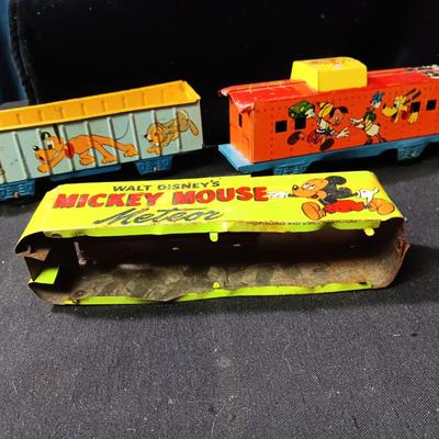 WALT DISNEY PRODUCTIONS TIN LITHO WIND UP TRAIN BY MARX (IN NEED OF REPAIR)