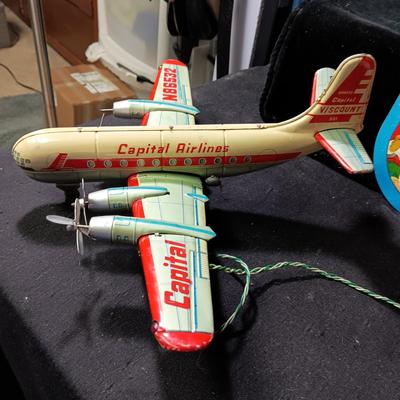 CAPITAL AIRLINES TIN LITHO TOY AIRPLANEE IN FAIR CONDITION AND 2 METAL CYMBALS? WITH GREAT GRAPHICS