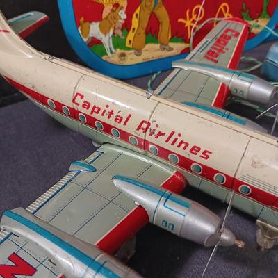 CAPITAL AIRLINES TIN LITHO TOY AIRPLANEE IN FAIR CONDITION AND 2 METAL CYMBALS? WITH GREAT GRAPHICS