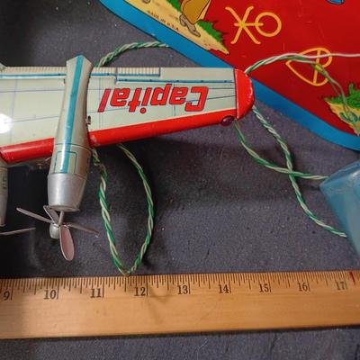 CAPITAL AIRLINES TIN LITHO TOY AIRPLANEE IN FAIR CONDITION AND 2 METAL CYMBALS? WITH GREAT GRAPHICS
