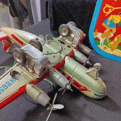 CAPITAL AIRLINES TIN LITHO TOY AIRPLANEE IN FAIR CONDITION AND 2 METAL CYMBALS? WITH GREAT GRAPHICS