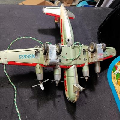 CAPITAL AIRLINES TIN LITHO TOY AIRPLANEE IN FAIR CONDITION AND 2 METAL CYMBALS? WITH GREAT GRAPHICS