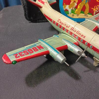 CAPITAL AIRLINES TIN LITHO TOY AIRPLANEE IN FAIR CONDITION AND 2 METAL CYMBALS? WITH GREAT GRAPHICS