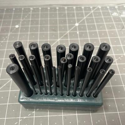 Sale Photo Thumbnail #127: 28-Piece durable heat-treated steel punches with indexed stand for accuracy.