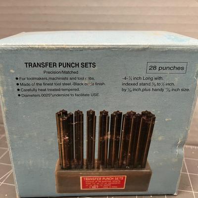 Sale Photo Thumbnail #128: 28-Piece durable heat-treated steel punches with indexed stand for accuracy.