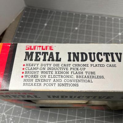 Sale Photo Thumbnail #154: Heavy-duty die-cast timing light for 12-volt systems.