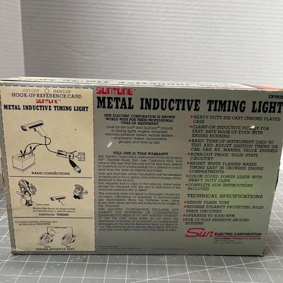 Sale Photo Thumbnail #155: Heavy-duty die-cast timing light for 12-volt systems.