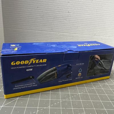 Sale Photo Thumbnail #200: 12V powered, 60W suction. Wet/dry use, bagless, hose included.