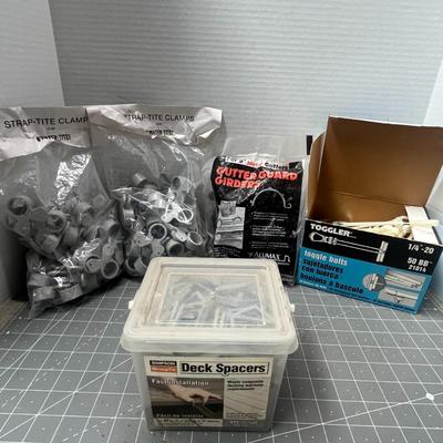 Sale Photo Thumbnail #230: Includes 60 spacers, 50 togglers, clamps, 5" gutter girders.