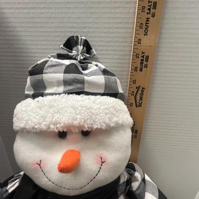 Sale Photo Thumbnail #298: Wears checkered outfit, faux fur trim, scarf, and hat.