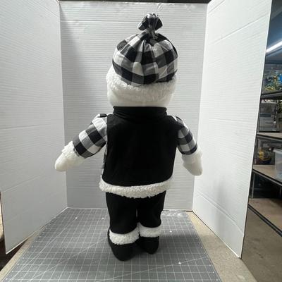 Sale Photo Thumbnail #299: Wears checkered outfit, faux fur trim, scarf, and hat.