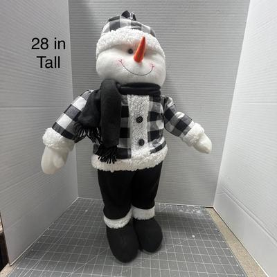 Sale Photo Thumbnail #297: Wears checkered outfit, faux fur trim, scarf, and hat.