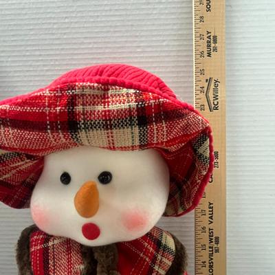 Sale Photo Thumbnail #308: Wears red plaid coat, green pants, holds “Merry Christmas” book.