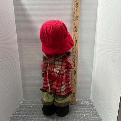 Sale Photo Thumbnail #307: Wears red plaid coat, green pants, holds “Merry Christmas” book.