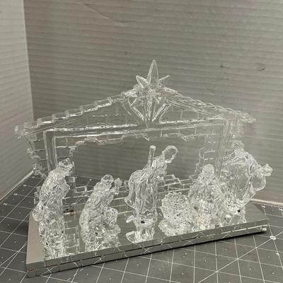 Sale Photo Thumbnail #312: Includes 6 clear figures under LED-lit stable; musical base plays “Silent Night.”