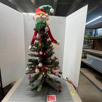 Sale Photo Thumbnail #369: Red/green elf topper, ornaments, multicolor lights, tripod base.