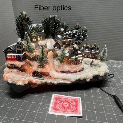 Sale Photo Thumbnail #398: Lights up, snowy buildings, sleigh, figurines.