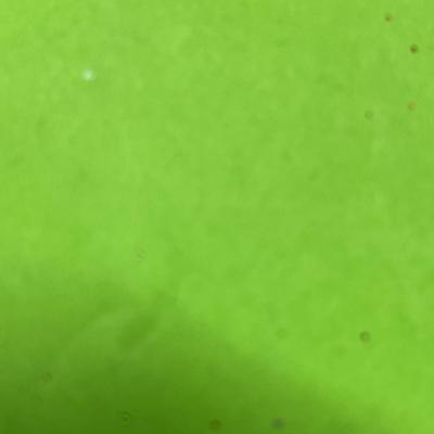 Sale Photo Thumbnail #414: Red lantern with Santa, glass candle holder, pine, berries.