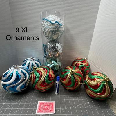 Sale Photo Thumbnail #439: Set of 9; Red, green, gold, silver, blue—swirl design, assorted sizes.