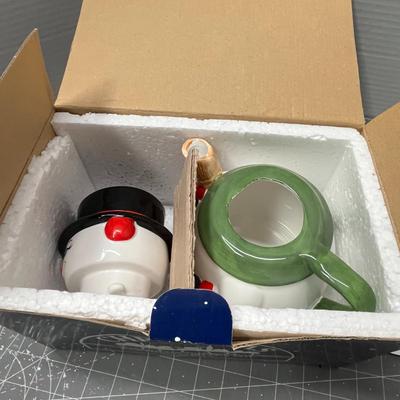 Sale Photo Thumbnail #444: Top hat, scarf, mittens, pipe—boxed Christmas Village design.