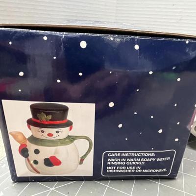 Sale Photo Thumbnail #443: Top hat, scarf, mittens, pipe—boxed Christmas Village design.