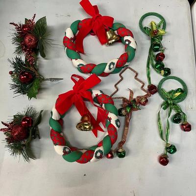 Sale Photo Thumbnail #455: Ornaments, braided wreaths, bells, crocheted Santa band.