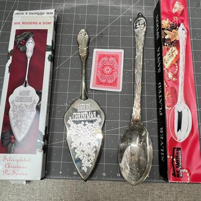 Sale Photo Thumbnail #465: Ornate handles, marked “International Silver Company.”