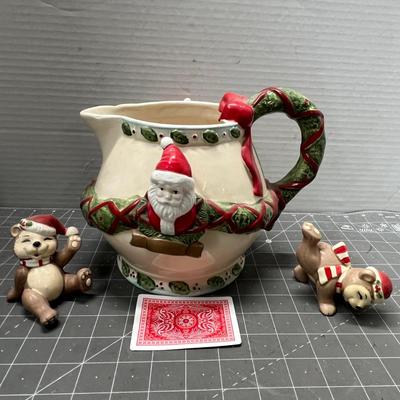 Sale Photo Thumbnail #486: Garland-handled pitcher with Santa face + 2 winter-dressed bear figurines.