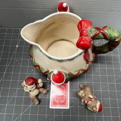 Sale Photo Thumbnail #487: Garland-handled pitcher with Santa face + 2 winter-dressed bear figurines.
