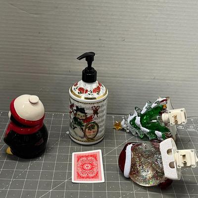 Sale Photo Thumbnail #496: Ceramic penguin, “Winter Berry” soap pump, tree & Santa night lights.