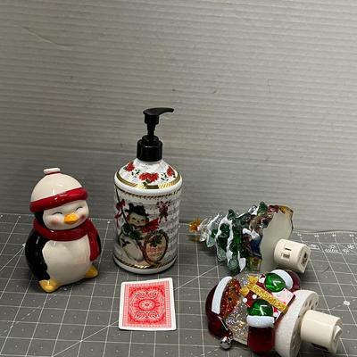 Sale Photo Thumbnail #495: Ceramic penguin, “Winter Berry” soap pump, tree & Santa night lights.