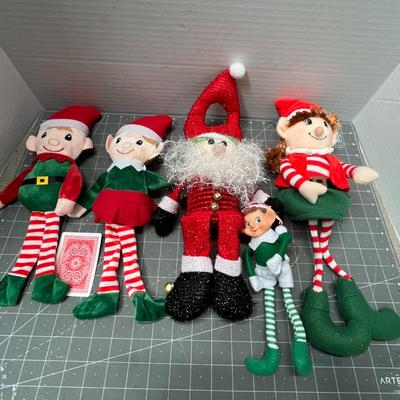 Sale Photo Thumbnail #507: 12 Pc, Assorted plush toys in Christmas outfits—Santa hats, scarves, elf suits.