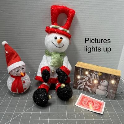 Sale Photo Thumbnail #510: Seated & standing glitter snowmen + framed winter scene with embedded lights.