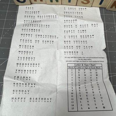 Sale Photo Thumbnail #568: 15 pc numbered blocks, snowman bag, printed holiday guide.