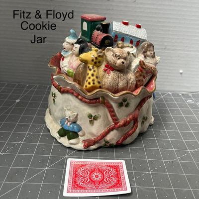 Sale Photo Thumbnail #580: Ceramic—bear, giraffe, train, doll, holly ribbon base.