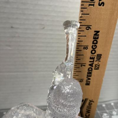 Sale Photo Thumbnail #588: Clear glass, 6 in tall—trumpet angel with wings and gown.