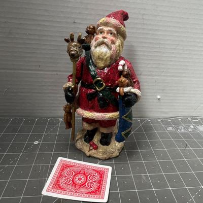 Sale Photo Thumbnail #590: Red suit—staff with reindeer head, blue sack with bear & candy cane.