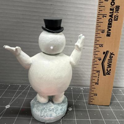 Sale Photo Thumbnail #595: 6.5 in tall—white snowman with hat, flower, base and box.
