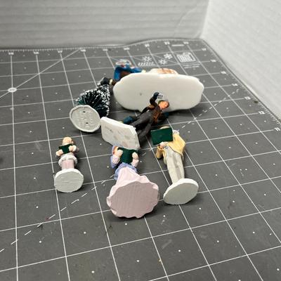 Sale Photo Thumbnail #612: People skating, sledding, dancing, singing, trees, ice patches.