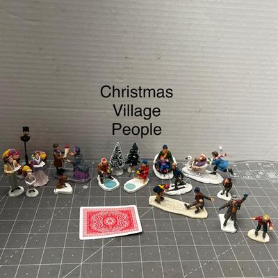 Sale Photo Thumbnail #605: People skating, sledding, dancing, singing, trees, ice patches.