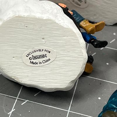 Sale Photo Thumbnail #611: People skating, sledding, dancing, singing, trees, ice patches.