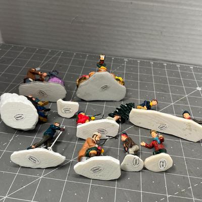 Sale Photo Thumbnail #610: People skating, sledding, dancing, singing, trees, ice patches.