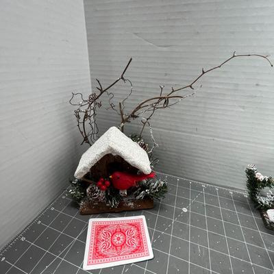 Sale Photo Thumbnail #616: 13 pc—snow-roof birdhouses with red birds and greenery.