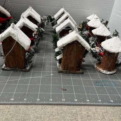 Sale Photo Thumbnail #618: 13 pc—snow-roof birdhouses with red birds and greenery.