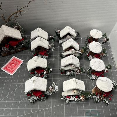 Sale Photo Thumbnail #617: 13 pc—snow-roof birdhouses with red birds and greenery.