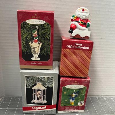 Sale Photo Thumbnail #621: 7 pc—3 boxed (Santa cradle, house, bears) + 4 loose Santa-themed figures.