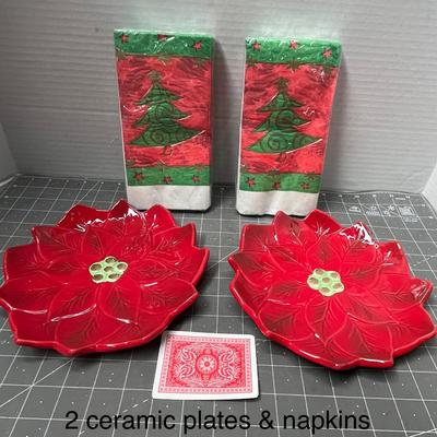 Sale Photo Thumbnail #645: Red Crate & Barrel plates and 2 white “party house” napkins.